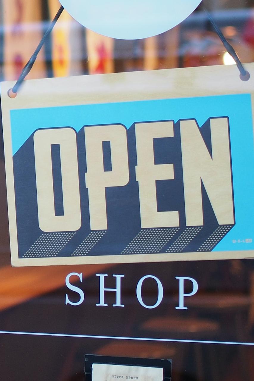 gray and blue Open signage
